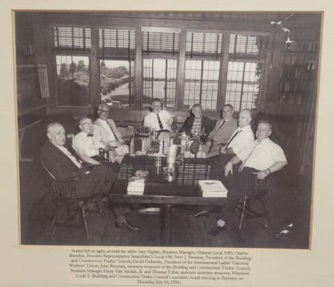 Electrical industry meeting in a historic black-and-white photo.