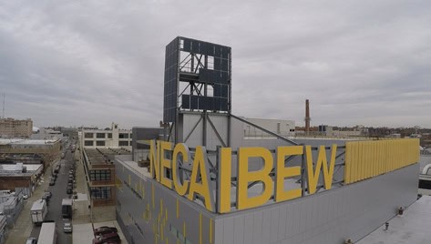 Exterior view of the NECA IBEW building in an urban setting.